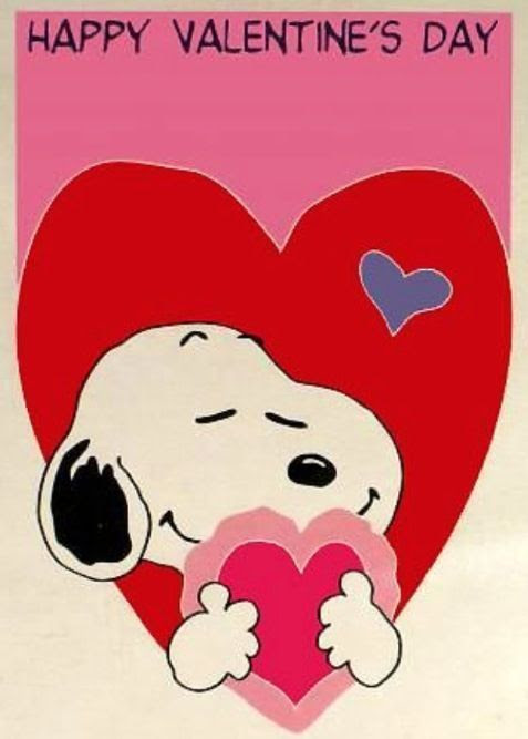 Snoopy holding a valentine